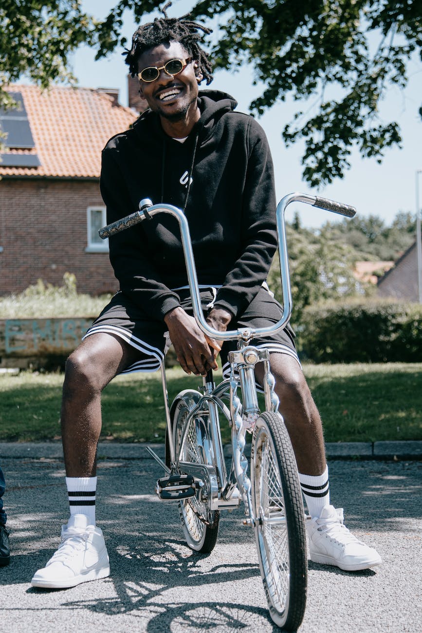 man sitting on a bicycle