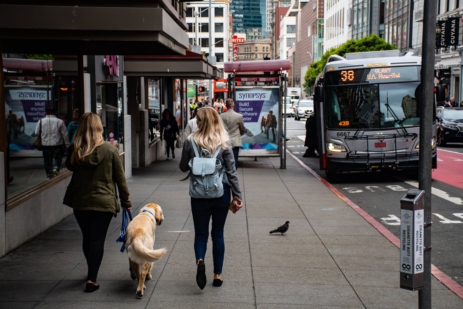 women walking on side street