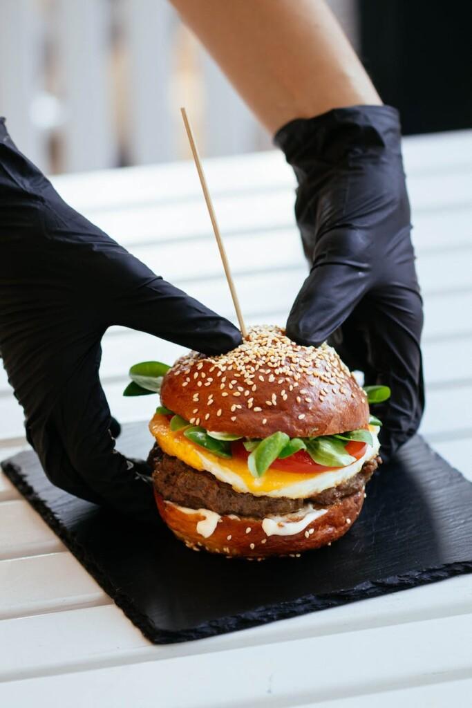 selective focus photography of skewed cheeseburger