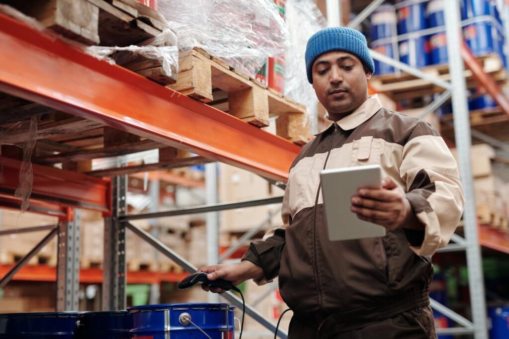 man holding digital tablet