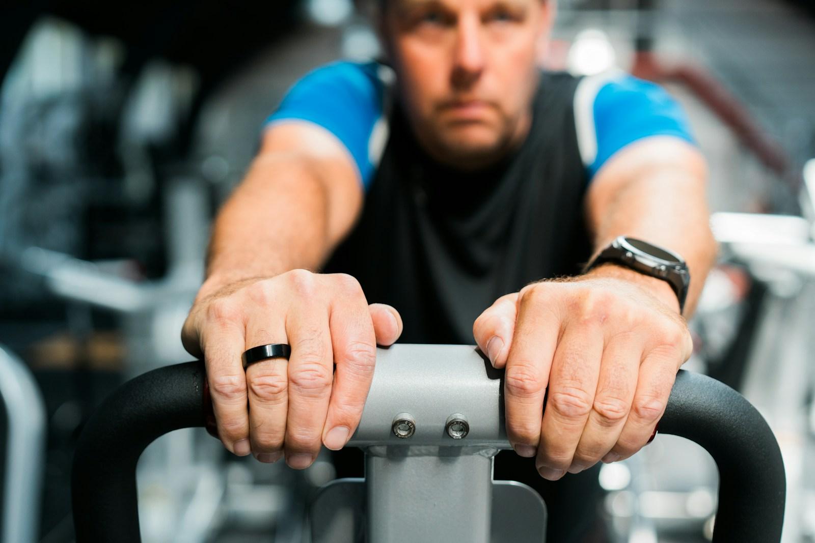 A man working out on a stationary exercise bike